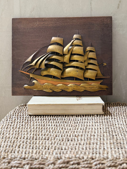 Brass and Copper Ship on Wood